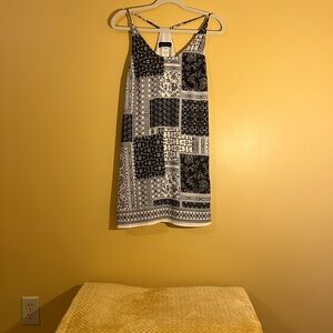 B. Darlin Black and Tan Mini Dress